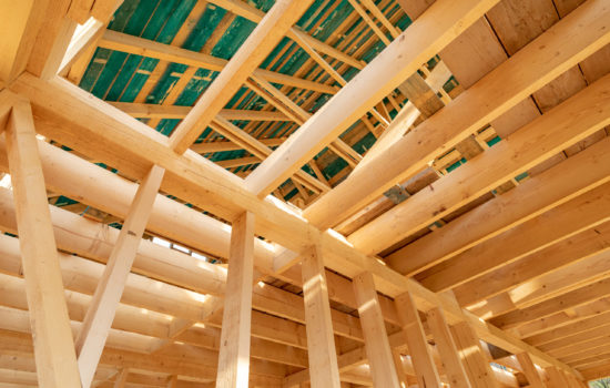 New interior residential wooden construction house framing